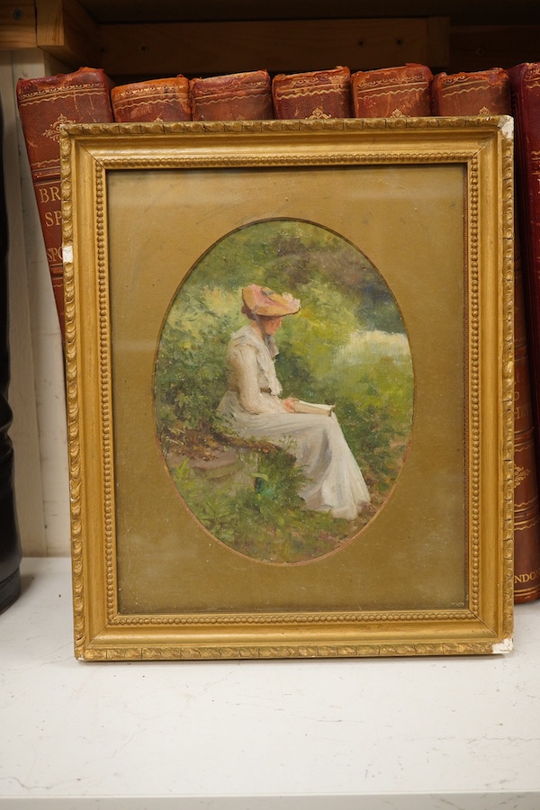 Fred Colin Tilney (1870-1951), oval oil on canvas, Study of an Edwardian seated lady reading, 23 x 17cm. Condition - fair, canvas not flat within the frame